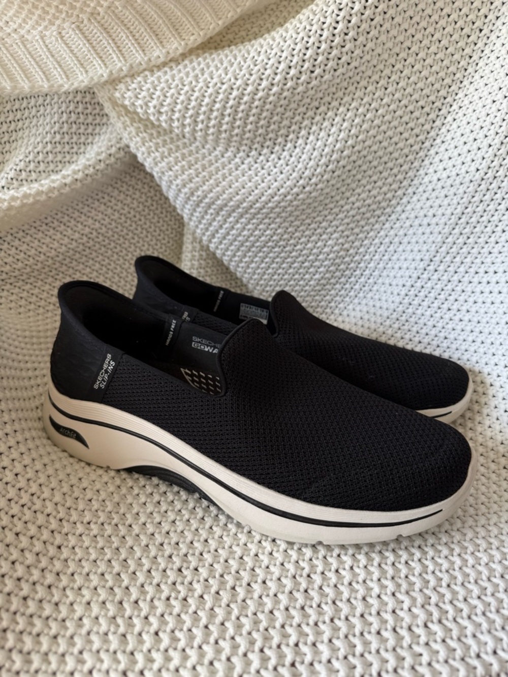 Skechers Black Knit Slip-On Sneakers with White Midsole